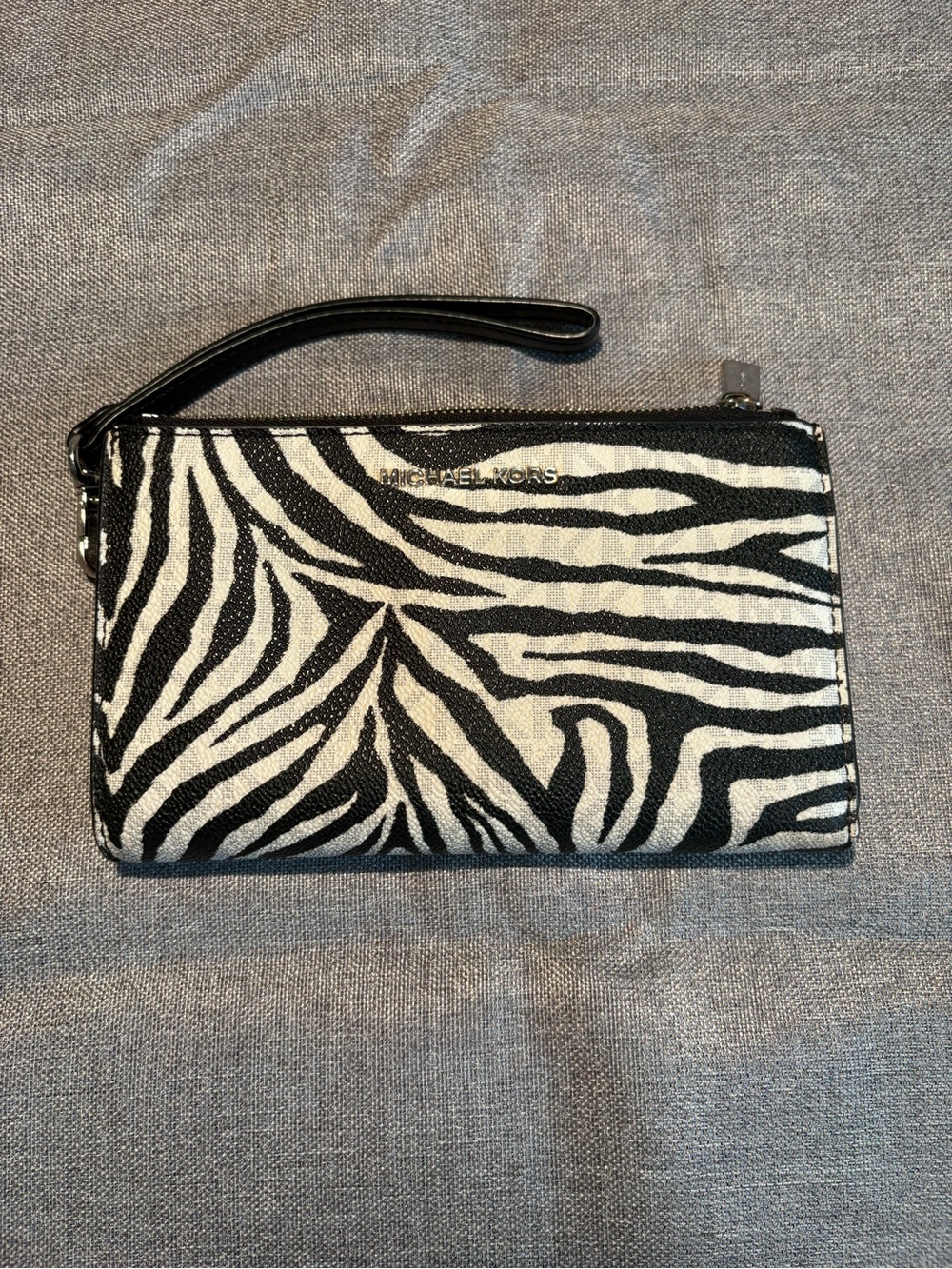 Michael Kors Black & White Zebra Print Wristlet with Gold Logo